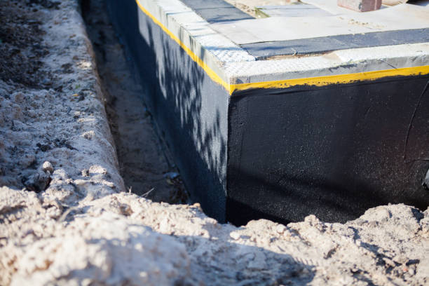 Professional Foundation Crack Repair technician working in Deer Lodge, TN